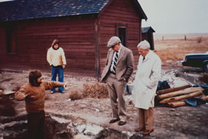 Photo of Robert W. Campbell and Juhn M Taylor talking to John Brumley.