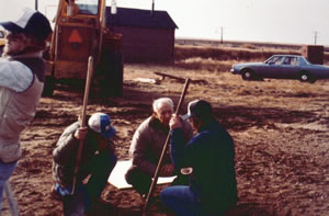 Photo of Bill Webb and the crew installing the commemorative cairn.