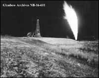 Photo: Okalta well at night, Turner Valley, Alberta. Date unknown (Glenbow Archives NB-16-601) 